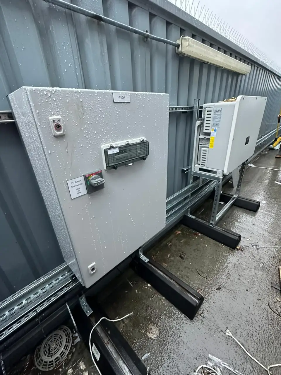PVDB main isolator and inverter on commercial rooftop