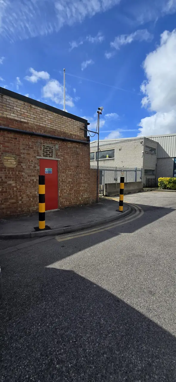 Industrial unit access with new bollards and drainage works